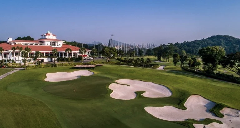 The iconic 18th hole of the New Tanjong and the clubhouse at Sentosa Golf Club.